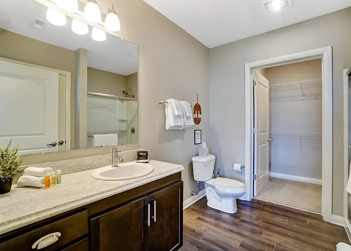 The Urban Oasis Garage Parking Walk-in Shower