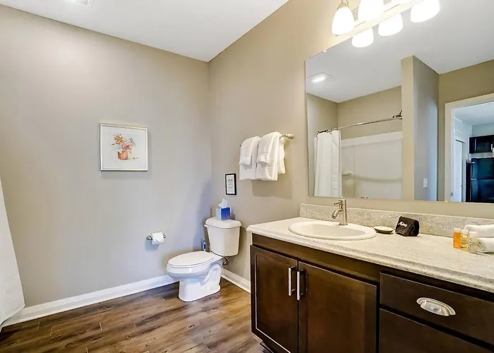 The Urban Oasis Garage Parking Walk-in Shower